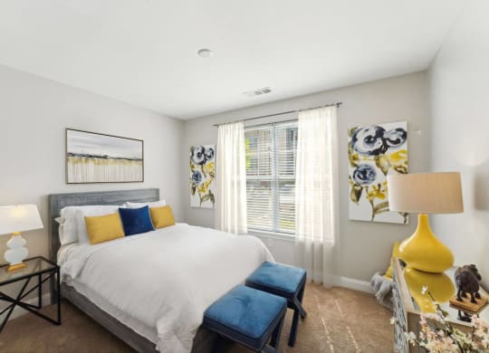 a bedroom with a large bed and a window at The Tannery, Connecticut, 06033