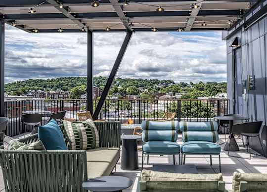 A patio with a view of the cityscape.