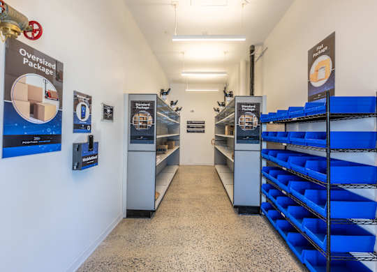 A long hallway with a sign that says Overized Package.
