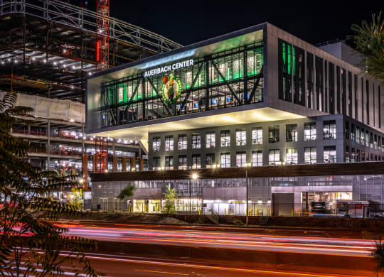 Boston Landing windows lit up at night, Allston MA