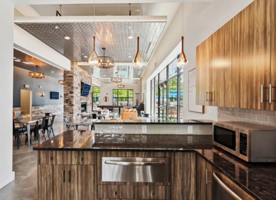 a kitchen with a counter top and a microwave at The Tannery, Glastonbury