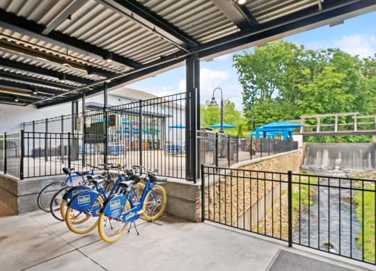 a group of bikes parked outside of a bike rack at The Tannery, Glastonbury, Connecticut