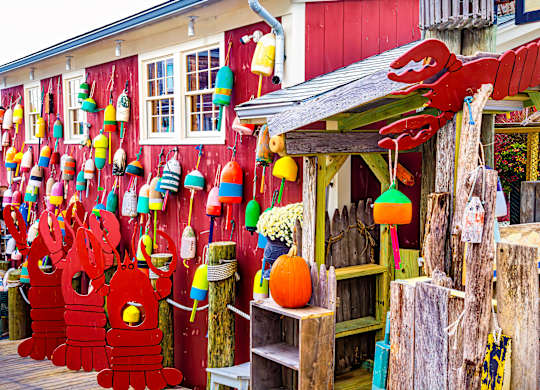 A red building with lobster decorations on the outside.