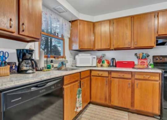 Kitchen with cabinets at Haven East, Brunswick, ME
