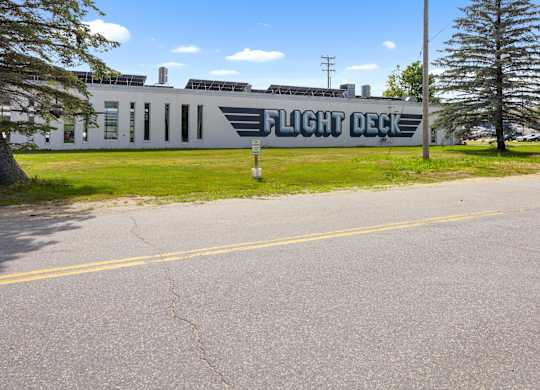 A white building with the words