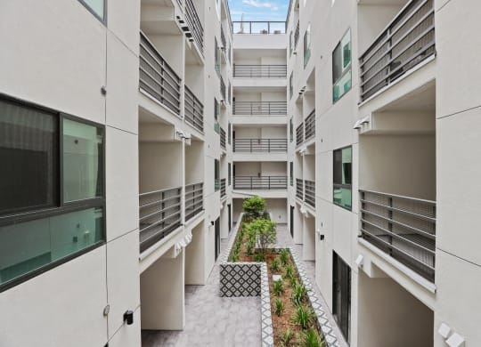 a view of an apartment complex with balconies at The Fairfax Flats Apartments, California
