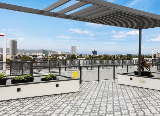 a view of the city from a roof top terrace at The Fairfax Flats Apartments, Los Angeles, CA