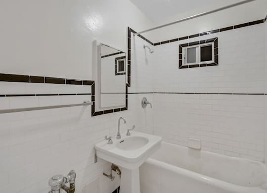Bathroom with shower at The Langham Apartments, Los Angeles, California