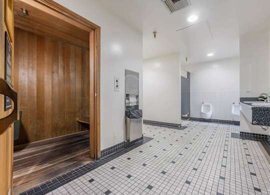 Bathroom with sink and mirror at Grand Central Market Apartments, Los Angeles, CA