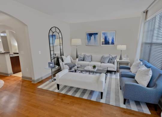 Living Room with Blue and White Couches at The Estates at Ballantyne, Charlotte, NC, 28277