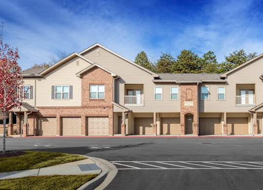 an empty parking lot in front of an apartment building at Echo at Lake Norman, Mooresville
