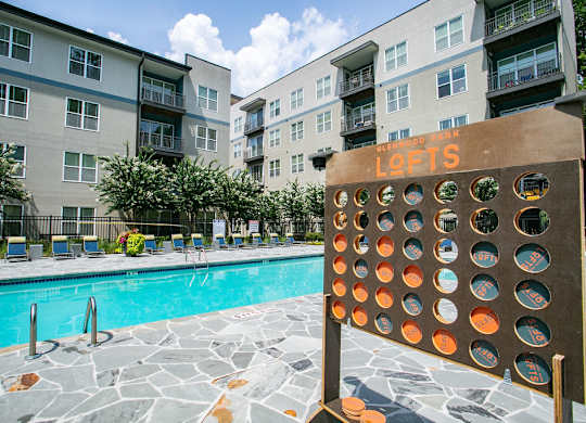 poolside games like connect 4 at Glenwood Park Lofts, Georgia, 30316