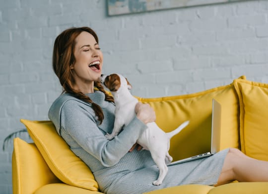 Woman with cute puppy