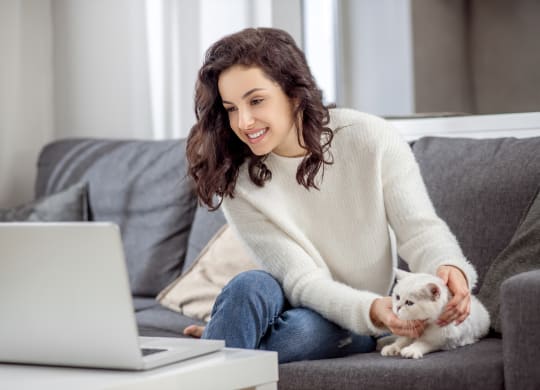Woman on couch with cat