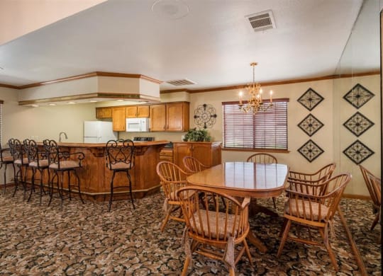 Clubhouse Kitchen Breakfast Bar with Stools at Oxford Park Apartments, Fresno, California
