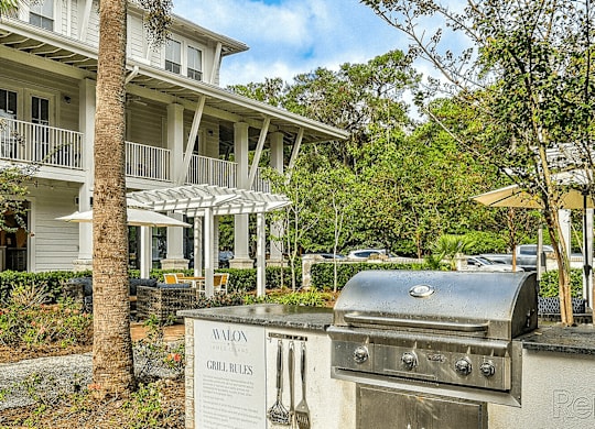 A grill with a sign that says
