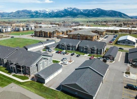 a city with mountains in the background at Madison Park, Bozeman, 59718