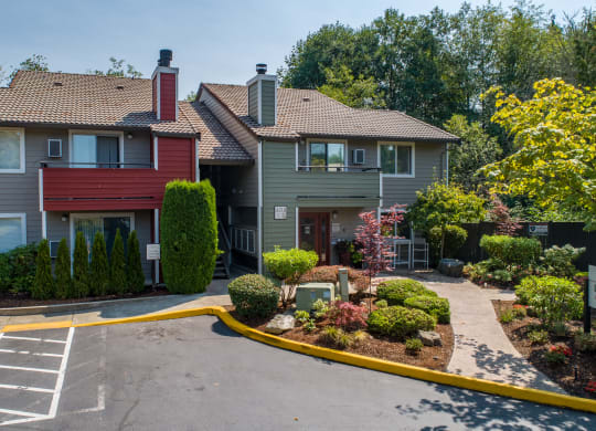 the view of a house with a driveway and landscaping in front of it at Quartz Creek, Washington, 98043