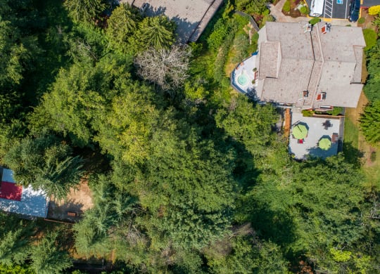 a birds eye view of a house with trees and a pool at Quartz Creek, Mountlake Terrace, WA, 98043