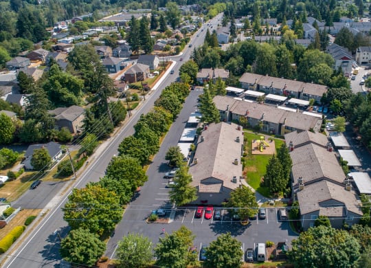 an aerial view of a neighborhood with houses and trees at Quartz Creek, Washington, 98043