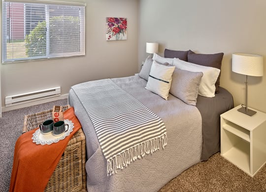 the preserve at ballantyne commons apartments bedroom with bed at Quartz Creek, Mountlake Terrace, Washington