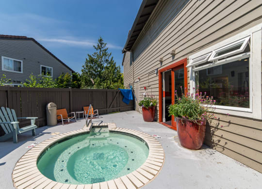 a small pool sits in the backyard of a house at Quartz Creek, Washington