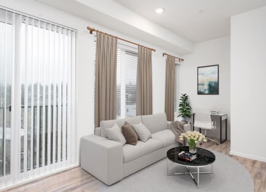 a living room with a couch and a table at The Loop at Green Lake, Washington, 98115