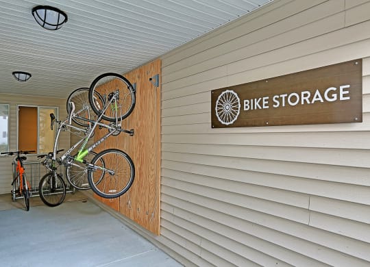 the bike storage area of the bike store with bikes on the wall  at Townside Flats, Washington, 98052