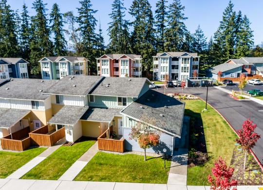 an aerial view of a row of houses on a street at Woodcreek, Poulsbo Washington