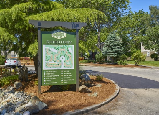 a sign that reads directory in front of a parking lot  at Woodhaven, Everett, WA