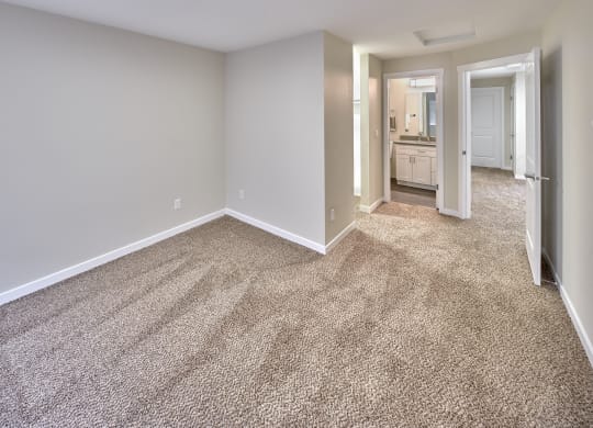 Bedroom area with wooden floor at Arterra Apartments, Kent