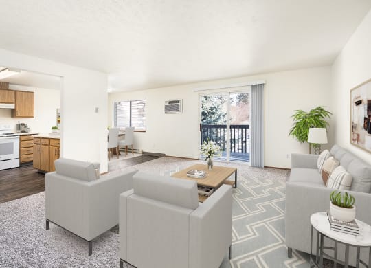 Spacious living room with glass sliding doors to private covered balcony. Living room staged with a couch, 2 chairs, and a coffee table. at Clearwater, Post Falls, ID 83854