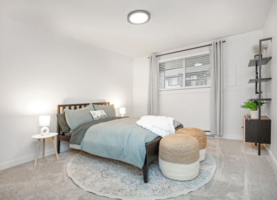 a bedroom with a bed and a rug at Brix, Walla Walla