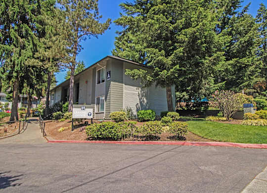 A house with a driveway in front of it.