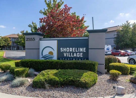 a sign for shortline village in front of a parking lot  at Shoreline Village, Richland, 99352