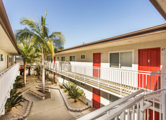 Pacific Sands walkway with tropical landscaping at Pacific Sands, San Diego, CA, 92117