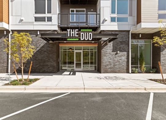 front of the duo with sidewalk and parking lot at The Duo, Washington