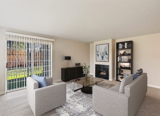 Carpeted living room, gas fireplace, and mantle in the center, with sliding glass doors to a grass lawn.at Capitol Crossing, Olympia, WA
