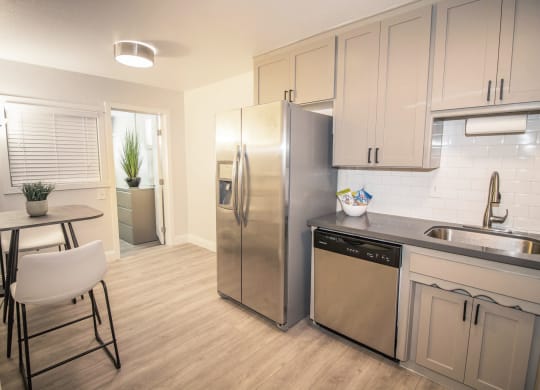 Woodland Village with kitchen and dining area at Woodland Village Apartments , California
