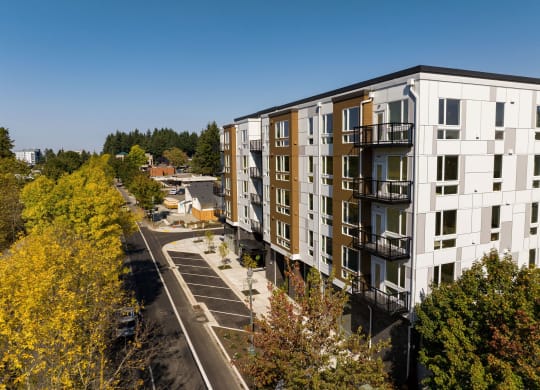 an aerial view of an apartment building on a city street at The Duo, University Place, 98466