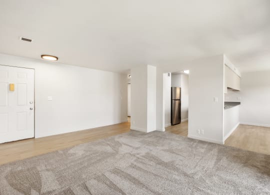 a living room with white walls and taupe carpet  at Brix, Washington, 99362