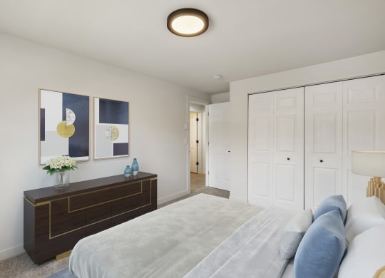 a bedroom with white walls and a large white bed  at Brix, Washington, 99362