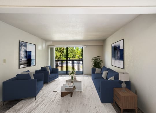 a living room with blue couches and a coffee table at Cedarwood, Wenatchee, WA 98801