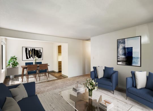 a living room with blue couches and chairs and a dining room table at Cedarwood, Wenatchee, WA
