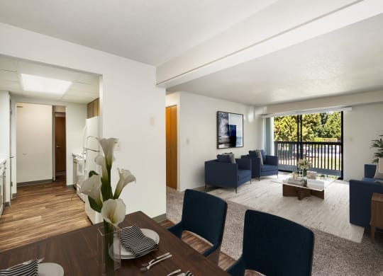 a living room and dining room with a table and chairs  kitchen at Cedarwood, Wenatchee, 98801