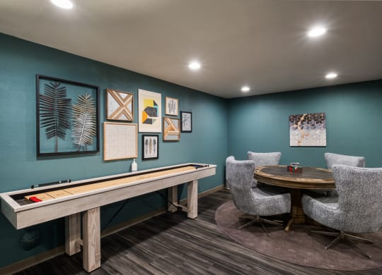 a games room with a foosball table and ping pong table at Cedarwood, Renton Washington