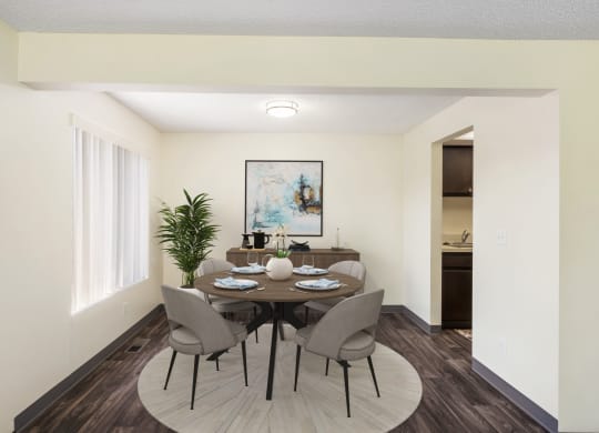a dining room with a table and chairs at Castlerock, Wenatchee, WA
