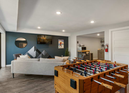 Room with foosball table and a couch at Castlerock, Wenatchee, WA 98801