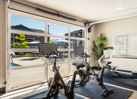 the gym at the enclave at woodbridge apartments in sugar land, tx  at Altitude, East Wenatchee