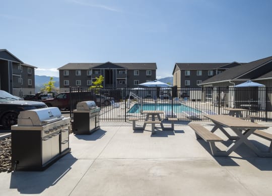 take a dip in the pool at the whispering winds apartments in pearland, tx  at Altitude, Washington, 98802
